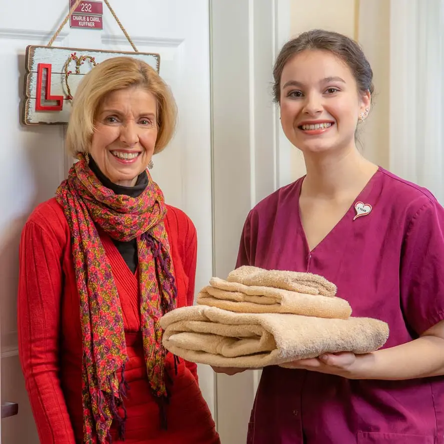 Belmont Gardens women given towels to women