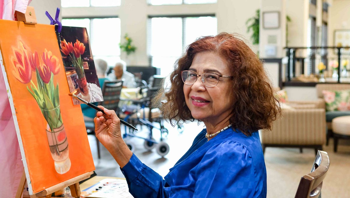 Belmont Gardens resident painting