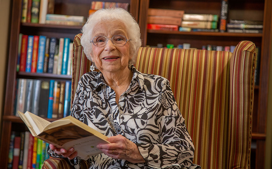 Independent Centreville senior reading a book
