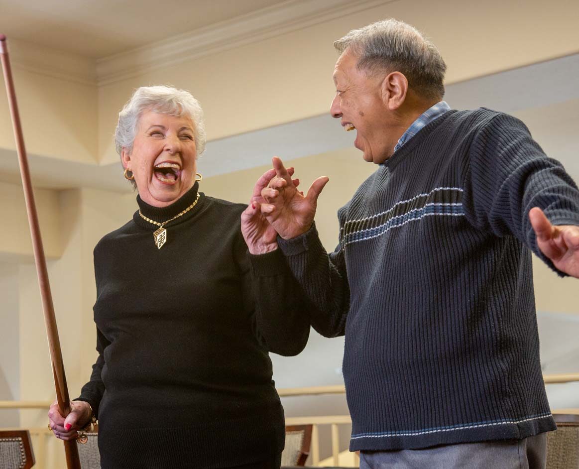 Belmont Gardens seniors playing billiards
